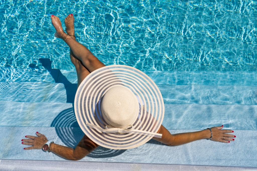 woman relaxing in swimming pool